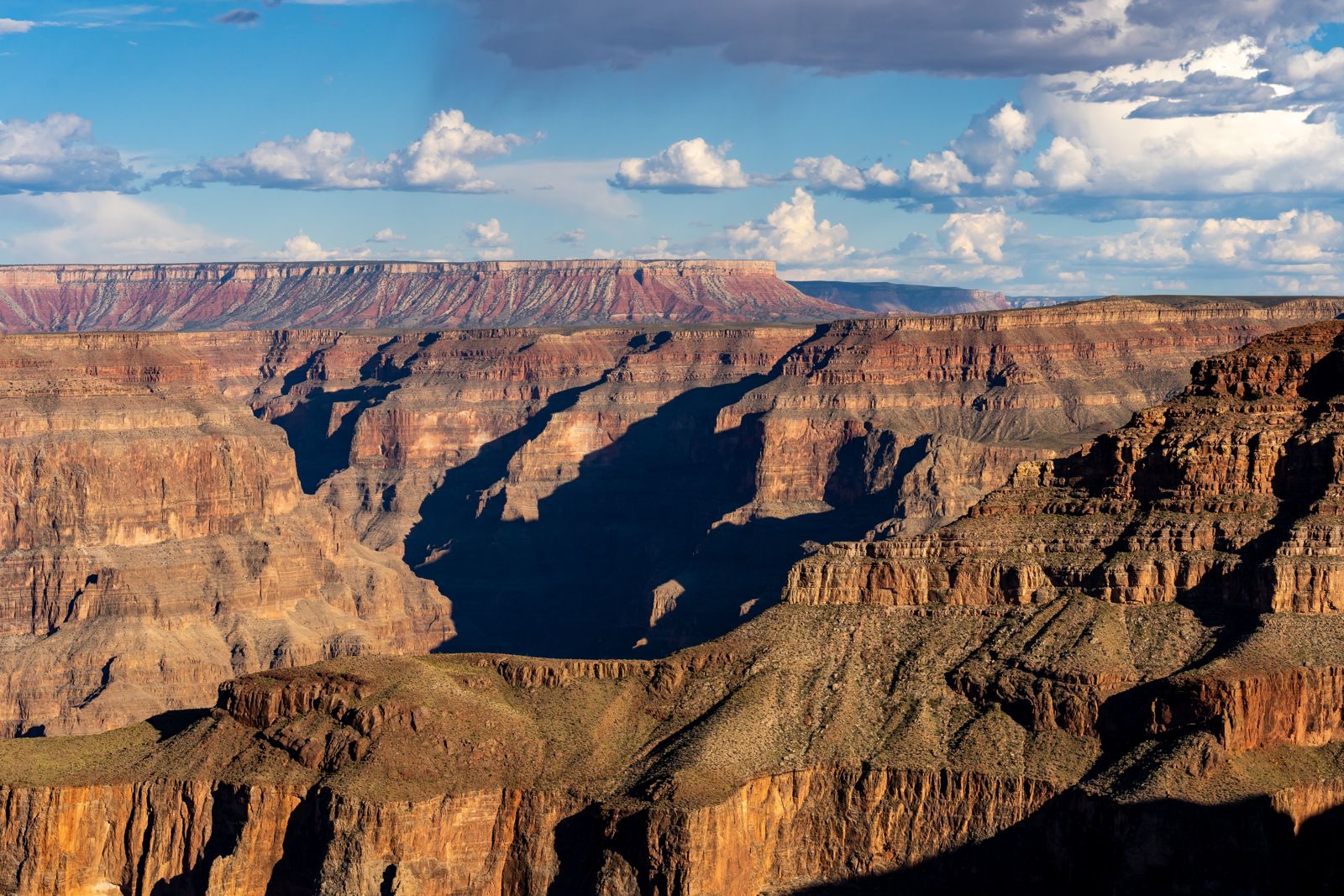 Deep side canyons and flat-topped mesas seen from the canyon's West Rim